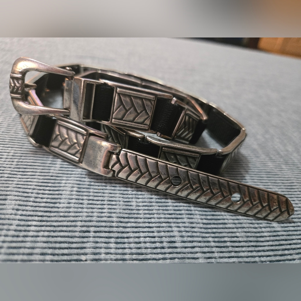 Chico's Silver tone linked black elastic hook closure belt.